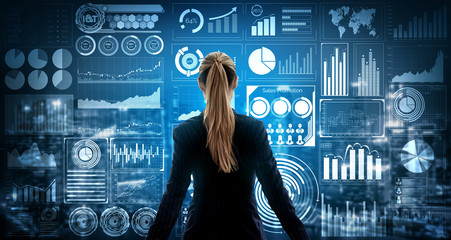 Big Data Technology for Business Finance Analytic Concept. Modern graphic interface shows massive information of business sale report, profit chart and stock market trends analysis on screen monitor.