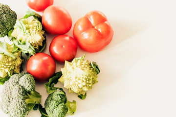 Plant based raw food seasonal vegetables background, vegan food cooking ingredients, top view.