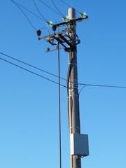 Electric pole with wires. Photo of an electric pylon.