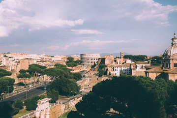 Fototapeta na wymiar Panoramic view of city Rome with Roman forum and Colosseum from Vittoriano