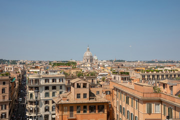 Panoramic view of city Rome with old houses from the Spanish steps