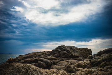 Clouds and the sea above the rocks