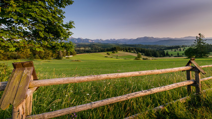 Mountains  landscape with wooden fence