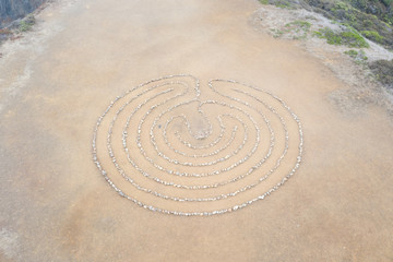 A circular rock labyrinth is found on the edge of the Pacific Ocean just north of San Francisco,...