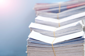 Stacks of paper files work desk office, business report papers, piles of unfinished documents, Business concept.