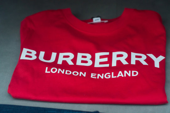 Mulhouse - France - 8 September 2019 - Closeup Of Burberry Sign On Red Tee Shirt In Fashion Store Showroom