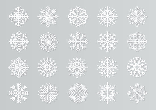Paper cut snowflakes. White 3D Christmas design templates for decoration and greeting cards. Vector handmade isolated white paper cutout snow elements set