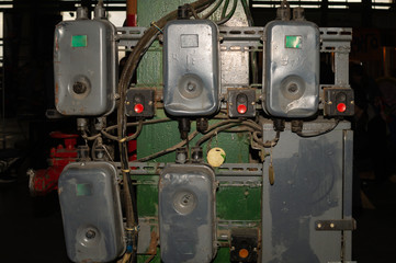 Fototapeta premium Retro switch box system. old power panel with buttons in the factory