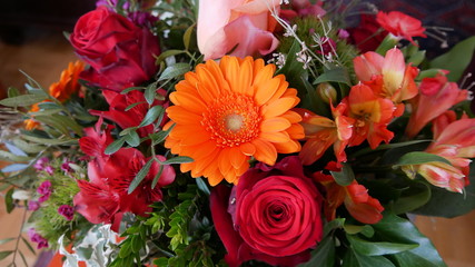 bouquet of red  and orange flowers