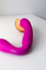 vibrators for any choice, different colors and sizes on a white background with peach