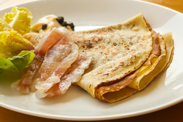 Gravlax with pancake served salad