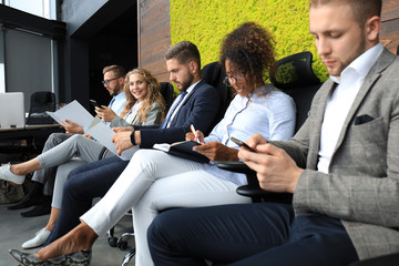 Modern business people waiting for job interview