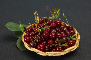 Sweet ripe cherry with leaves