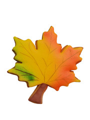gingerbread in the form of a maple leaf on a white background