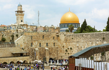 The wailing wall in Jerusalem Israel with the Dome of the rock in the background. The wailing wall is the wester wall of what was the temple mount for the Jews.