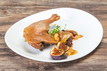 Roasted. duck. leg with plum and apple