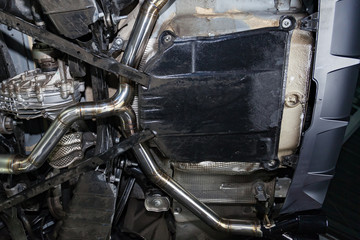 Fabrication and installation of a stainless steel car exhaust pipe with a bifurcation and a louder...