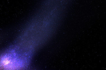 Photograph of the night sky, with a luminous trail of stars and a colored nebula