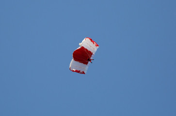 Parachute display team performs  during cricket festival at Isa Town, Bahrain