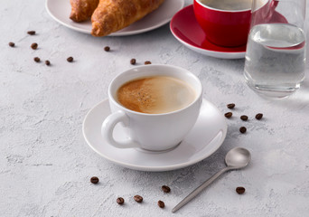 Breakfast with hot delicious coffee and croissants