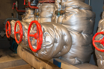 Industrial central heating system with insulation to maintain a high efficient warmth distribution...