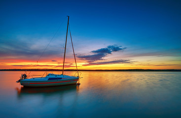 Beautiful summer sunset over water