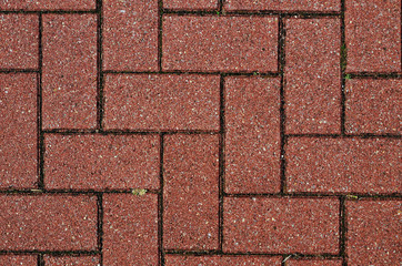 Close up of red paving