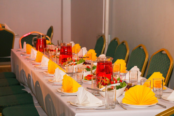 Solemnly elegantly laid table in the restaurant