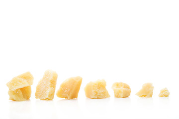 Parmesan cheese pieces isolated