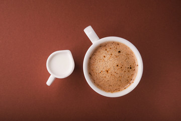 Coffee cup with milk carafe