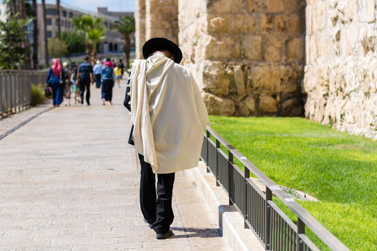 Ultra Orthodox Jewish Man Walking On Street Of Jerusalem