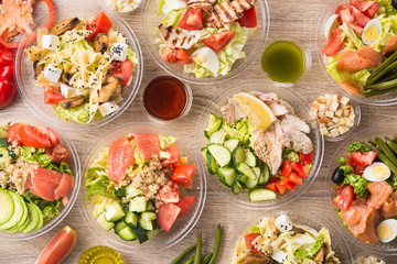 Fototapeta na wymiar food plastic take away container with fresh salad