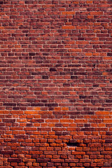 Fototapeta na wymiar Red bricks wall background. Old building surface