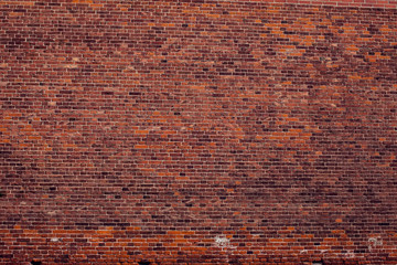 Red bricks wall background. Old building surface