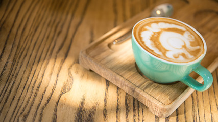 Italian cafe, turquoise color of cappuccino coffee cup