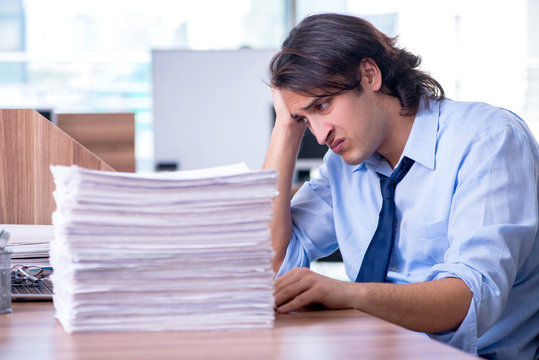 Young Employee Unhappy With Excessive Work