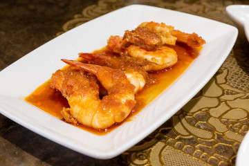 Burmese shrimp curry in white plate
