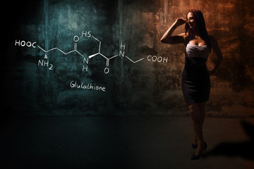 Sexy girl or secretary or female student presenting handdrawn chemical formula of Glutathione...