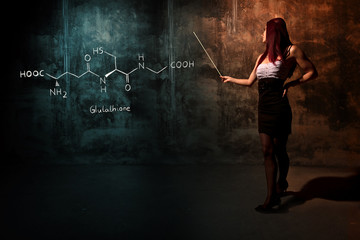 Sexy girl or secretary or female student presenting handdrawn chemical formula of Glutathione...