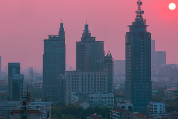 Fototapeta premium pink sunset over the city in china