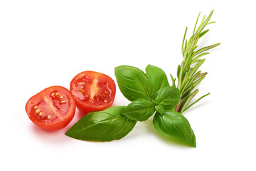 Fresh organic basil leaves with tomato slices, isolated on white background