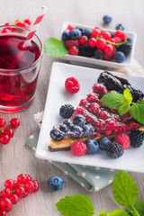 Sweet dessert cake with red lemonade drink
