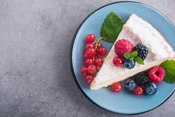Sweet dessert cake with blackberry, raspberry, currants