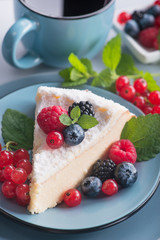 Sweet dessert cake with fresh blackberry, raspberry, currants and blueberry