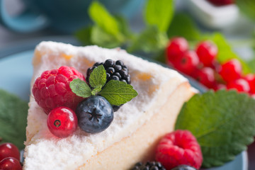 Sweet dessert cake with blackberry, raspberry, currants