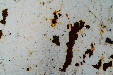 Rusty metal surface. Rust spot. Texture with different scratches and lines. Main part of surface covered blue paint. Background for text and design