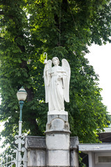 A statue of an angel placed at the entrance to the sanctuary in Lourdes