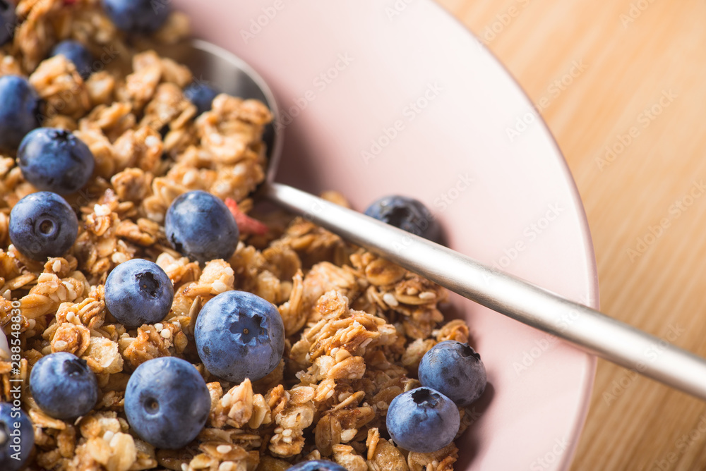 Wall mural Sweet breakfast granola with blueberry