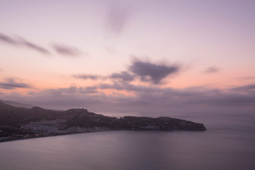 Fototapeta premium Beautiful sunrise on the Costa Tropical of Granada, Views of La Herradura from Cerro Gordo.