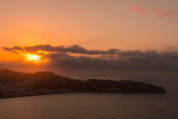 Fototapeta premium Beautiful sunrise on the Costa Tropical of Granada, Views of La Herradura from Cerro Gordo.